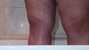 BBW MILF mom peeing in the shower in slow motion